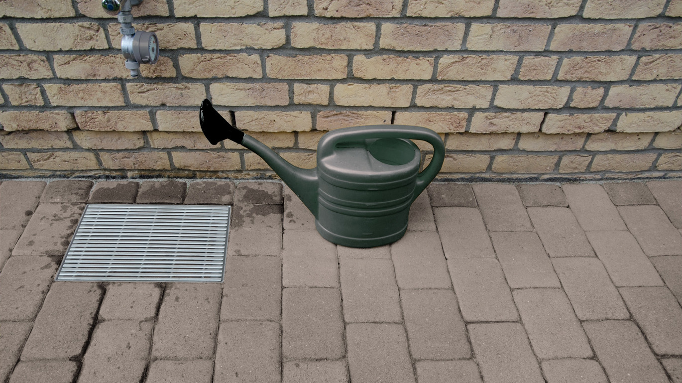 Hofablauf Wasserhahn Giesskanne
